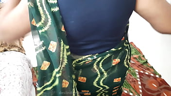 Sultry Desi Bhabhi In A Dark Green Saree: A Tempting Vision Of Desire