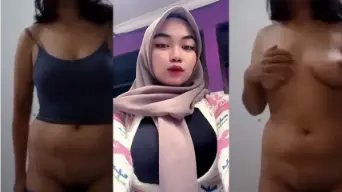 Bidadari Berjilbab Dengan Payudara Besar Yang Menggairahkan