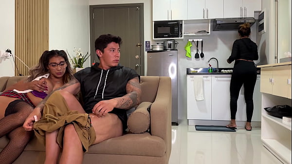 Unaware Mother Watches Tv As Her Daughter Seduces Her Boyfriend On The Living Room Sofa