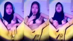 Montok Berhijab Mengocok Kontol