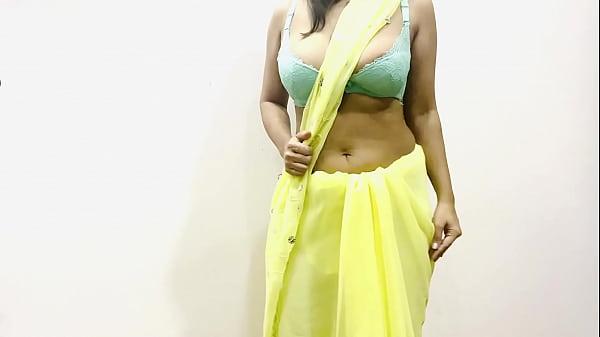 Big Boobs Indian Bhabhi Teases In A Tight Yellow Saree, Ready To Fuck