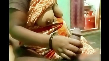 Indian Aunty’s Hand Sliding On A Hard Young Cock, Making It Throb